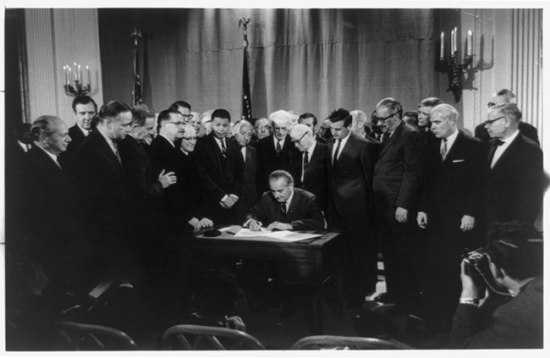President Lyndon Johnson signing the Fair Housing Act